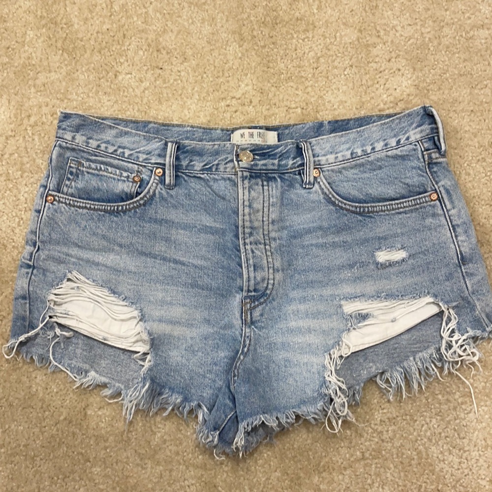 Distressed denim shorts by We The Free